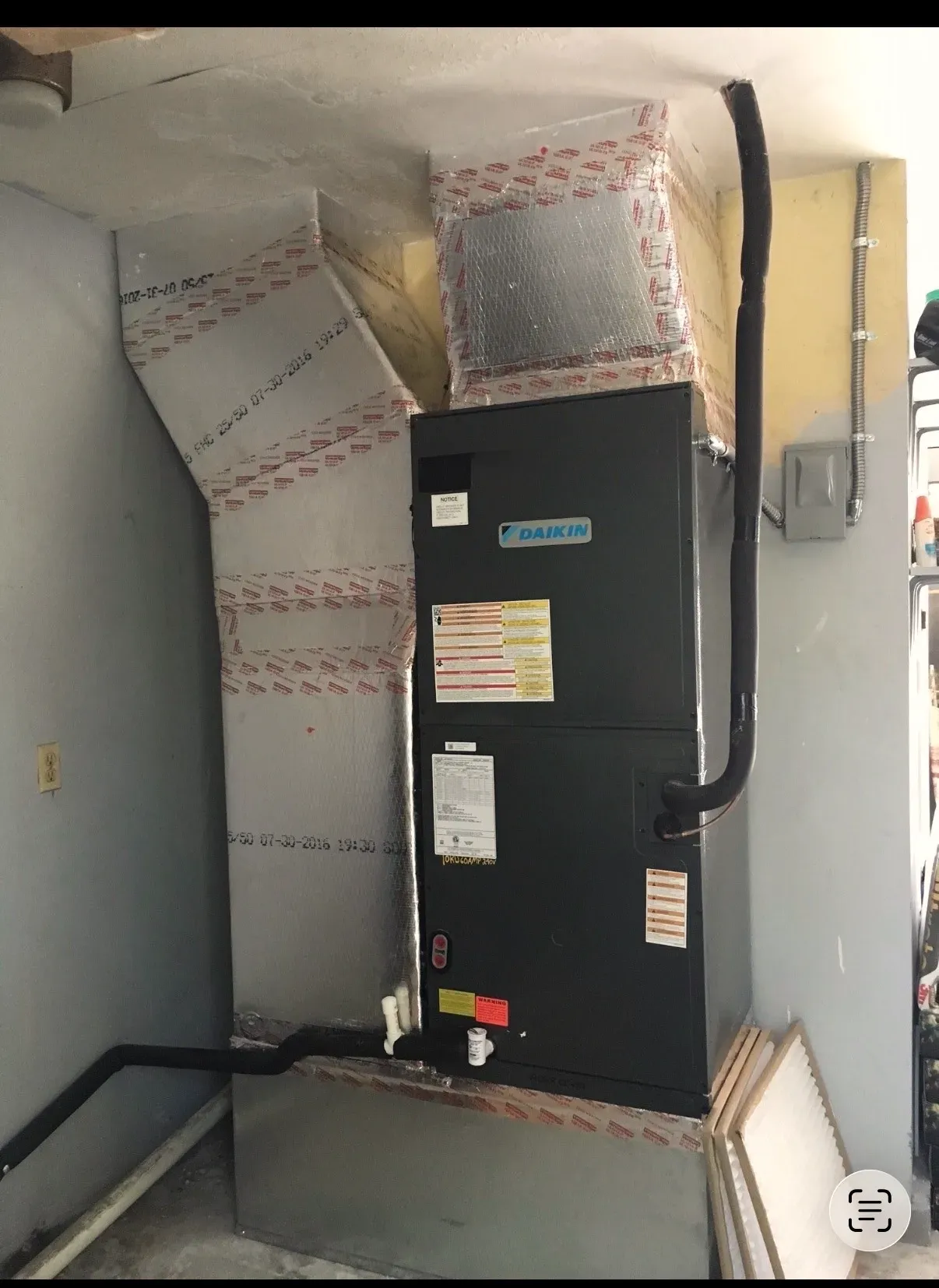 A Legacy residential air-handler installation in a closet