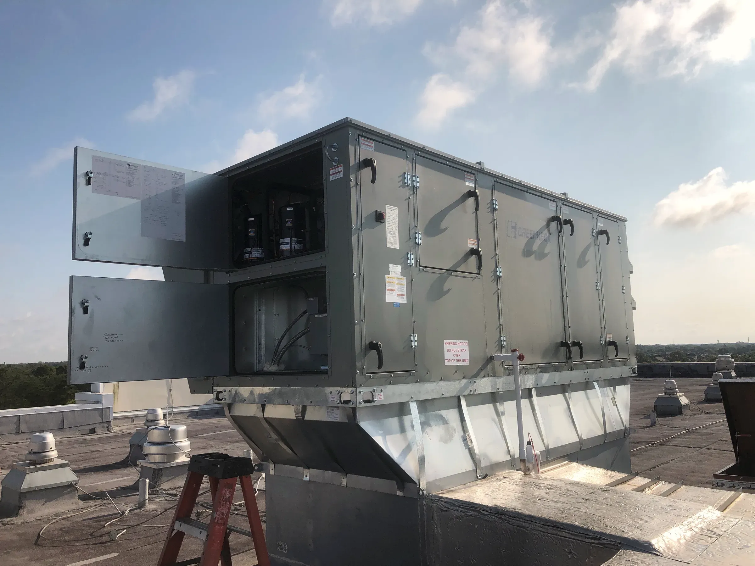 A commercial rooftop air-handling unit installed by Legacy